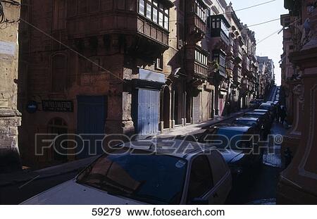 Row of cars in street, Malta, Europe View Large Photo Image Stock Photo - Row of cars in street, Malta, Europe . Fotosearch