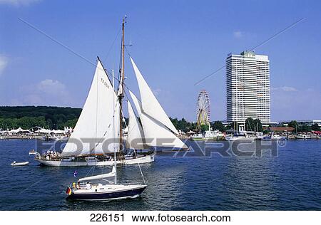 Sailboats in river, Maritim Hotel, Travemuende, Germany View Large Photo Image Stock Image - Sailboats in river, Maritim Hotel, Travemuende, Germany . Fotosearch