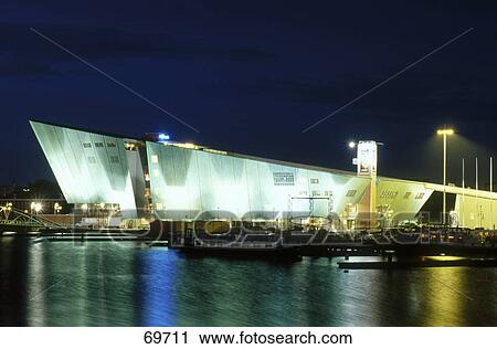 Science museum lit up at night, Nemo, Amsterdam, Netherlands View Large Photo Image Stock Image - Science museum lit up at night, Nemo, Amsterdam, Netherlands . Fotosearch
