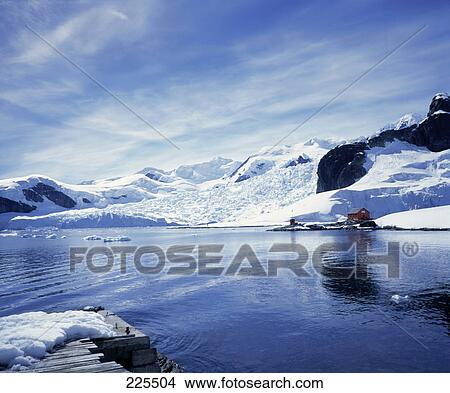 Snow covered mountain along sea, Paradise Bay, Antarctica View Large Photo Image Picture - Snow covered mountain along sea, Paradise Bay, Antarctica . Fotosearch