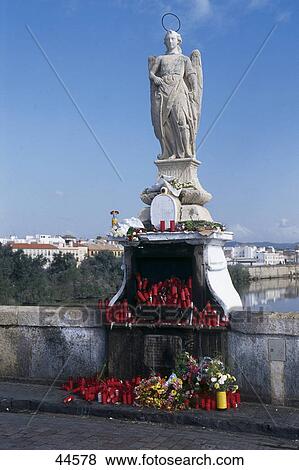 Statue of angel on bridge, Puente Romano, Cordoba, Roman Bridge, Andalusia, Spain View Large Photo Image Stock Photo - Statue of angel on bridge, Puente Romano, Cordoba, Roman Bridge, Andalusia, Spain . Fotosearch