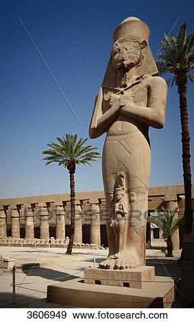 Statue Ramses II. and his faughter Merit-Amun, Temple of Karnak, Karnak, Egypt, Africa View Large Photo Image Stock Photo - Statue Ramses II. and his faughter Merit-Amun, Temple of Karnak, Karnak, Egypt, Africa . Fotosearch