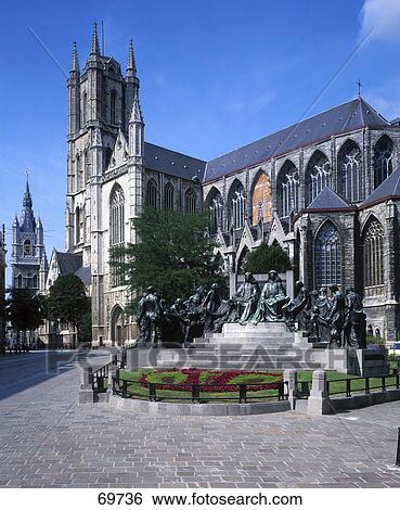 Stock Photograph - Statues in front of cathedral, St. Bavo Cathedral, Ghent, East Flanders, Germany . Fotosearch