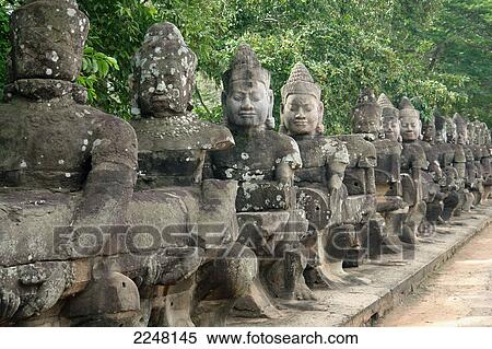 Stock Photography - Statues of Buddha in row, Angkor Wat, Angkor, Cambodia . Fotosearch
