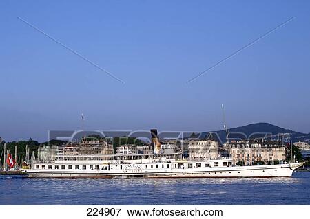 Steamer in lake under clear blue sky, Geneve, Switzerland View Large Photo Image Stock Photo - Steamer in lake under clear blue sky, Geneve, Switzerland . Fotosearch