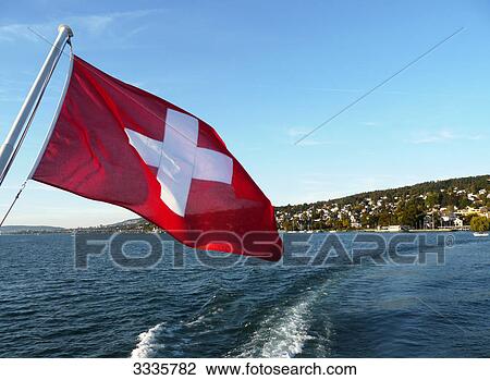 Swiss flag and Lake Zurich, Switzerland View Large Photo Image Stock Image - Swiss flag and Lake Zurich, Switzerland . Fotosearch
