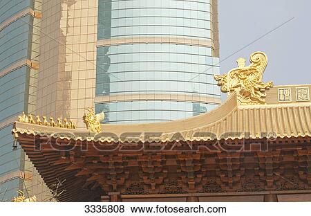 Stock Photo - Temple roof, office building in the background, Shanghai, China, detail . Fotosearch