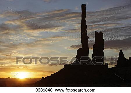 Totem Pole Monument at sunset, Monument Valley, Utah, USA View Large Photo Image Stock Photo - Totem Pole Monument at sunset, Monument Valley, Utah, USA . Fotosearch