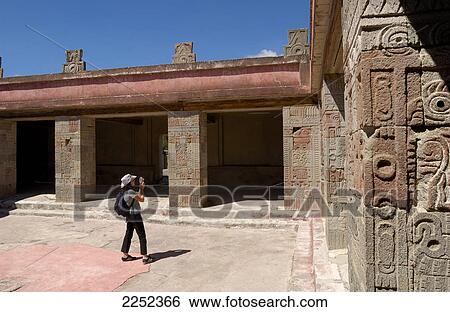 Tourist taking picture at archaeological site, Quetzalcoatl, Teotihuacan, Mexico  View Large Photo Image Stock Photograph - Tourist taking picture at archaeological site, Quetzalcoatl, Teotihuacan, Mexico . Fotosearch