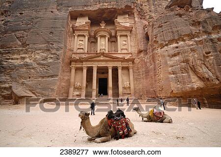 Tourists and camels in front of treasure house, Petra, Wadi Musa, Jordan View Large Photo Image Stock Photo - Tourists and camels in front of treasure house, Petra, Wadi Musa, Jordan . Fotosearch