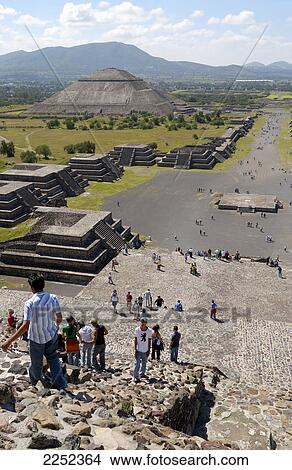 Tourists at archeological site, Avenue of the Dead, Teotihuacan, Mexico View Large Photo Image Picture - Tourists at archeological site, Avenue of the Dead, Teotihuacan, Mexico . Fotosearch