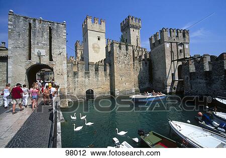Tourists in castle, Scaliger Castle, Sirmione, Italy View Large Photo Image Stock Image - Tourists in castle, Scaliger Castle, Sirmione, Italy . Fotosearch
