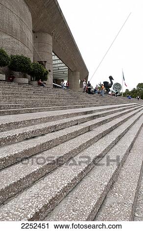 Stock Image - Tourists in front of auditorium . Fotosearch