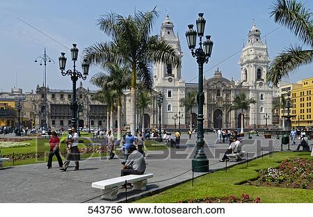 Stock Photograph - Tourists in front of cathedral in town square, Plaza-De-Armas, Lima, Lima Province, Lima Region, Peru . Fotosearch