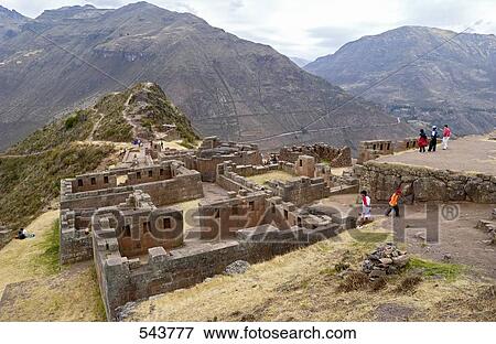 Tourists looking at old ruins, Inca Ruins, Machu Picchu, Cusco Region, Peru View Large Photo Image Stock Photo - Tourists looking at old ruins, Inca Ruins, Machu Picchu, Cusco Region, Peru . Fotosearch