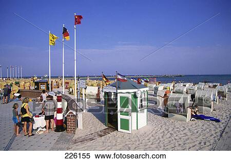 Stock Photography - Tourists on beach, Gromitz, Ostholstein, Schleswig-Holstein, Germany . Fotosearch