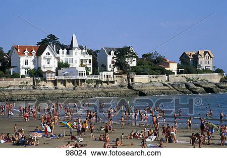 Tourists on beach, St. Palais-s-Mer, Poitou-Charentes, France View Large Photo Image Picture - Tourists on beach, St. Palais-s-Mer, Poitou-Charentes, France . Fotosearch