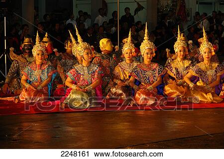 Traditional dancers performing dance based on Hindu epic Ramayana, Wat Trimitr, Bangkok, Thailand View Large Photo Image Stock Image - Traditional dancers performing dance based on Hindu epic Ramayana, Wat Trimitr, Bangkok, Thailand . Fotosearch