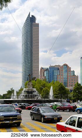 Traffic on road near fountain, Torre Mayor, Mexico City, Mexico View Large Photo Image Stock Photograph - Traffic on road near fountain, Torre Mayor, Mexico City, Mexico . Fotosearch
