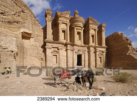 Two donkeys in front of rock grave, Petra, Wadi Musa, Jordan View Large Photo Image Picture - Two donkeys in front of rock grave, Petra, Wadi Musa, Jordan . Fotosearch