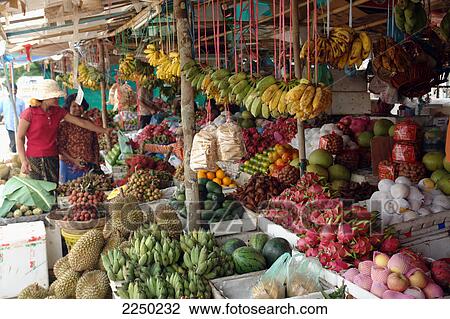 Two women at fruit market stall, Siem Reap, Cambodia View Large Photo Image Stock Image - Two women at fruit market stall, Siem Reap, Cambodia . Fotosearch