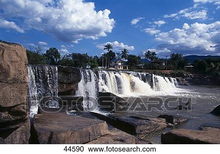 Waterfalls under cloudy sky, Phitsanulok, Thailand View Large Photo Image Stock Image - Waterfalls under cloudy sky, Phitsanulok, Thailand . Fotosearch