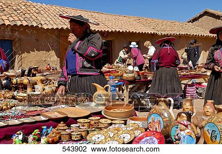 Woman selling souvenirs at market stall, Peru View Large Photo Image Stock Image - Woman selling souvenirs at market stall, Peru . Fotosearch