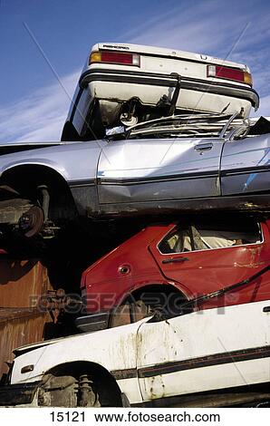 Wracked cars at scrap yard View Large Photo Image Stock Image - Wracked cars at scrap yard . Fotosearch