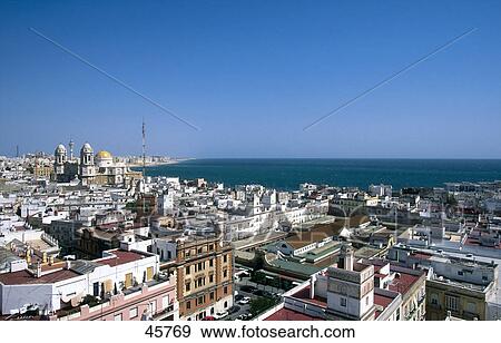 Aerial view of city at coast, Cadiz, Costa de la Luz, Andalusia, Spain View Large Photo Image Stock Photo - Aerial view of city at coast, Cadiz, Costa de la Luz, Andalusia, Spain . Fotosearch