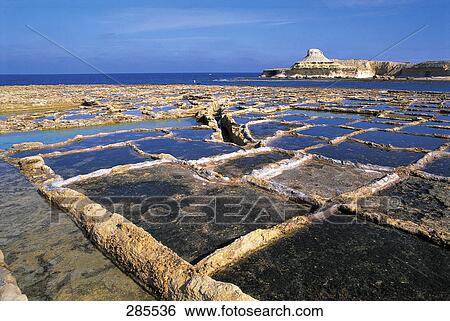 Aerial view of salt flats, Gozo, Malta View Large Photo Image Stock Photograph - Aerial view of salt flats, Gozo, Malta . Fotosearch