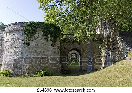 Stock Image - Ancient archway near tree on landscape, Chateau De La Bourdaisiere, Montlouis-Sur-Loire, France . Fotosearch