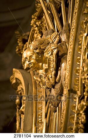 Picture - Angel sculptures carved on wall of church, Breil-sur-Roya, Provence-Alpes-Cote d'Azur, France . Fotosearch
