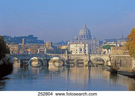 Arch bridge over river with St. Peter's Basilica, Tiber River, Vatican City, Rome, Italy View Large Photo Image Picture - Arch bridge over river with St. Peter's Basilica, Tiber River, Vatican City, Rome, Italy . Fotosearch