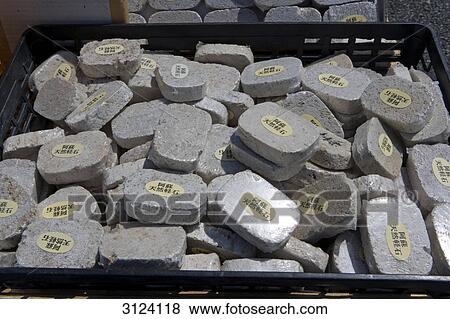 Basket filled with stones of the volcano Aso, Kyushu, Japan, close-up View Large Photo Image Stock Photo - Basket filled with stones of the volcano Aso, Kyushu, Japan, close-up . Fotosearch