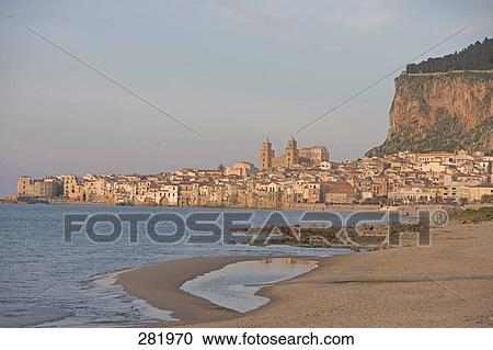 Beach with city at waterfront, Cefalu, Sicily, Italy View Large Photo Image Stock Image - Beach with city at waterfront, Cefalu, Sicily, Italy . Fotosearch