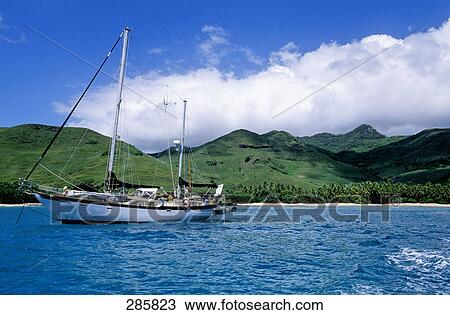 Boat moored near coast, Marquesas Islands, French Polynesia View Large Photo Image Stock Image - Boat moored near coast, Marquesas Islands, French Polynesia . Fotosearch