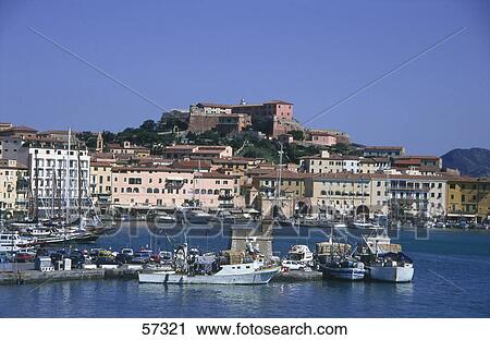 Boats at harbor with town in background, Portoferraio, Elba, Tuscany, Italy View Large Photo Image Stock Image - Boats at harbor with town in background, Portoferraio, Elba, Tuscany, Italy . Fotosearch