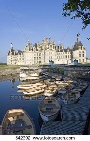 Boats in river in front of castle, Chateau De Chambord, Chambord, Loire-et-Cher, France View Large Photo Image Stock Image - Boats in river in front of castle, Chateau De Chambord, Chambord, Loire-et-Cher, France . Fotosearch