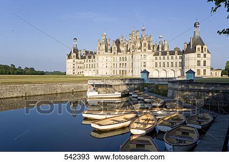 Boats in river in front of castle, Chateau De Chambord, Chambord, Loire-et-Cher, France View Large Photo Image Stock Image - Boats in river in front of castle, Chateau De Chambord, Chambord, Loire-et-Cher, France . Fotosearch