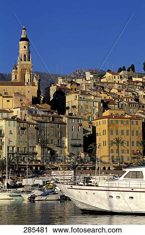Stock Image - Boats moored at harbor, Cote d'Azur, France . Fotosearch