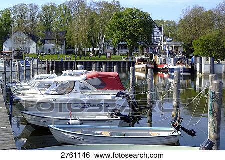 Boats moored at harbor, Hiddensee, Mecklenburg-Western Pomerania, Germany View Large Photo Image Stock Photograph - Boats moored at harbor, Hiddensee, Mecklenburg-Western Pomerania, Germany . Fotosearch