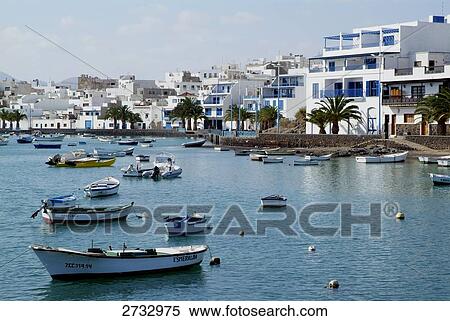 Boats moored at harbor View Large Photo Image Stock Photography - Boats moored at harbor . Fotosearch