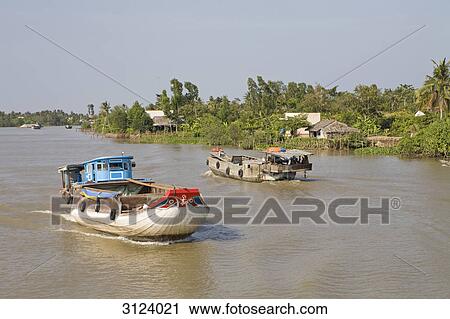 Boats on the Mekong River, Vietnam View Large Photo Image Stock Image - Boats on the Mekong River, Vietnam . Fotosearch