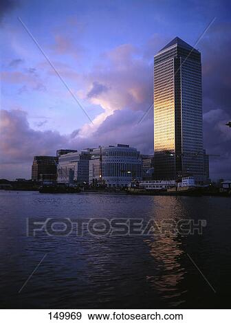 Buildings at waterfront, Canary Wharf, Thames River, London, England View Large Photo Image Stock Photo - Buildings at waterfront, Canary Wharf, Thames River, London, England . Fotosearch