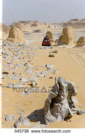 Car in arid landscape, Farafra Oasis, Libyan Desert, Egypt View Large Photo Image Stock Photo - Car in arid landscape, Farafra Oasis, Libyan Desert, Egypt . Fotosearch