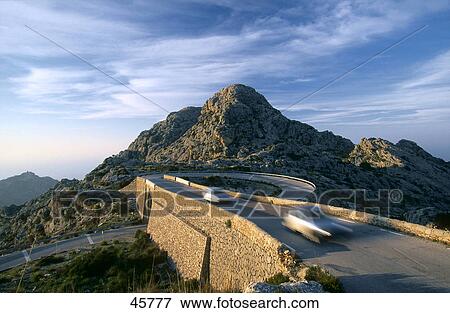 Stock Photo - Cars moving on road, Serra de Tramuntana, Majorca, Balearic Islands, Spain . Fotosearch
