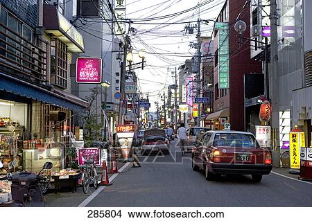 Cars on city street, Kyoto, Japan View Large Photo Image Picture - Cars on city street, Kyoto, Japan . Fotosearch