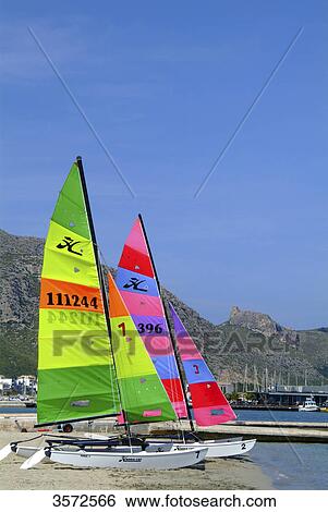Catamarans at beach, Pollenca, Mallorca, Spain, Europe View Large Photo Image Stock Photograph - Catamarans at beach, Pollenca, Mallorca, Spain, Europe . Fotosearch
