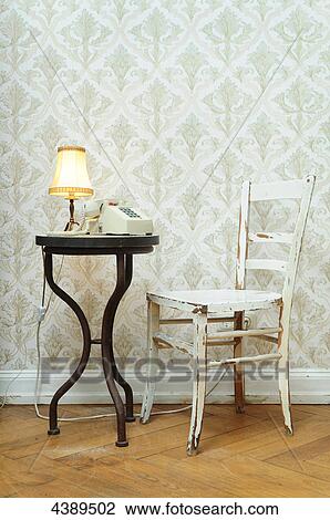 Chair and table with lamp and telephone View Large Photo Image Stock Image - Chair and table with lamp and telephone . Fotosearch