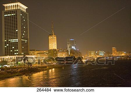 City at riverside lit up at night, Nile River, Cairo, Egypt View Large Photo Image Picture - City at riverside lit up at night, Nile River, Cairo, Egypt . Fotosearch